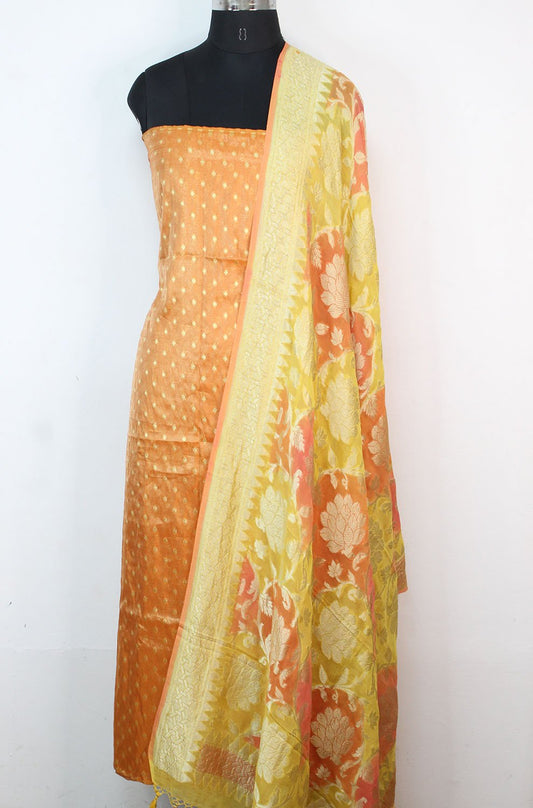Orange Handloom Banarasi Tissue Silk Suit With Yellow Handloom Banarasi Pure Georgette Brush Dyed Dupatta - Luxurion World