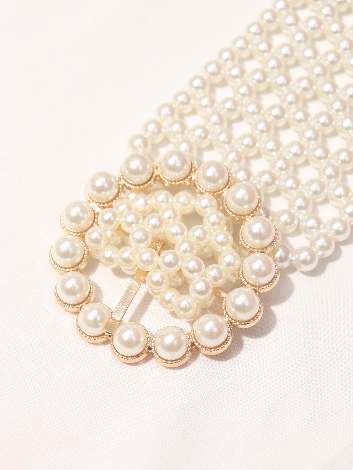 White Belt Collection: Stylish and Secure Outfit Elevators - Luxurion World