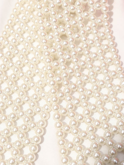 White Belt Collection: Stylish and Secure Outfit Elevators - Luxurion World